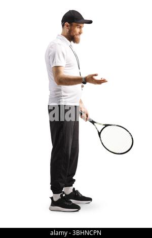 Tennis coach holding a racquet and talking isolated on white background Stock Photo