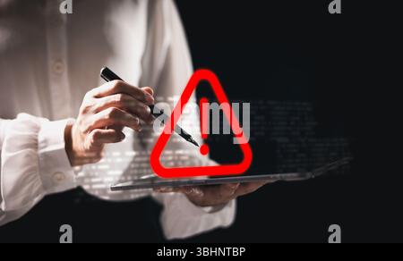 Phishing email alert concept with person using smartphone while surrounded by warning icons symbolizing scam messages cyber threats digital communicat Stock Photo