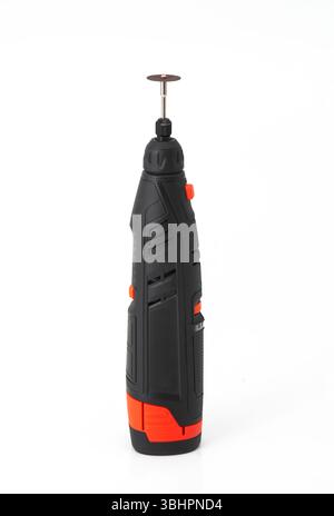 Close-up of a cordless rotary tool with cutting disc, isolated on white background, used for DIY, crafting, and precision work Stock Photo