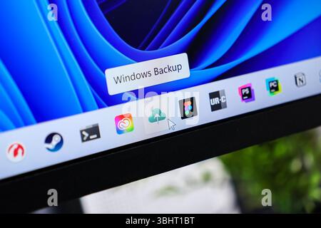 Poznan, Poland - June 6, 2025: The Windows Backup application icon on a computer screen, with a mouse cursor, illustrating cloud data storage and reli Stock Photo