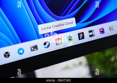 Poznan, Poland - June 6, 2025: Adobe Creative Cloud application visible on a high-resolution desktop, the cursor indicating digital software engagemen Stock Photo