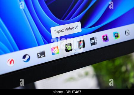 Poznan, Poland - June 6, 2025: Topaz Video AI application icon on Windows 11 taskbar, symbolizing powerful video editing and artificial intelligence t Stock Photo
