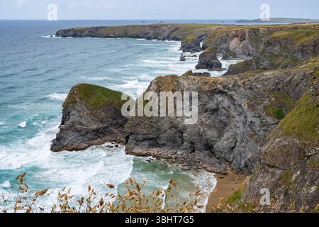 The dramatic coastline at Carnewas and Bedruthan on the north Cornwall coast, England with rock stacks and rugged cliffs. Stock Photo