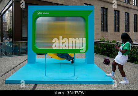 Brand activation for WhatsApp on the High Line Park in New York on Sunday, June 8, 2025. WhatsApp, an encrypted messaging app, is owned by Meta Platforms, formerly Facebook.  (© Richard B. Levine) Stock Photo
