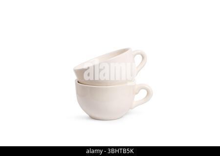 Two white cups isolated on a white background with copy space Stock Photo