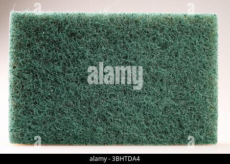 Green abrasive sponge texture for background Stock Photo