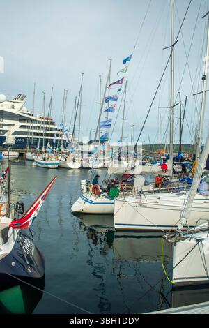 Yachts berthed in Lerwick Harbour after completing the Bergen–Shetland Race across the North Sea. Stock Photo