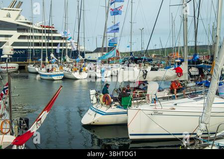 Yachts berthed in Lerwick Harbour after completing the Bergen–Shetland Race across the North Sea. Stock Photo