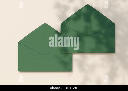 Paper envelopes on white surface with shadow patterns. 3d rendering Stock Photo