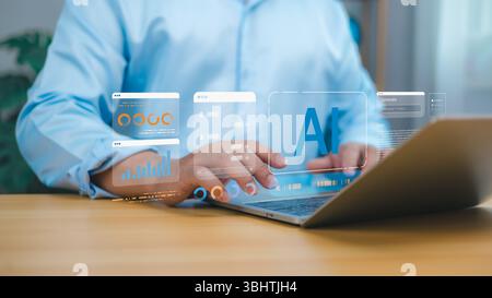 A professional businessman using a laptop with AI, data analysis, and graphs displayed as holograms, illustrating innovation, technology, and digital Stock Photo