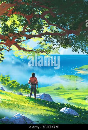 A man in a red jacket stands beneath a large tree on a sunlit hilltop, gazing out over a bright blue ocean and lush green coastal landscape, digital a Stock Photo
