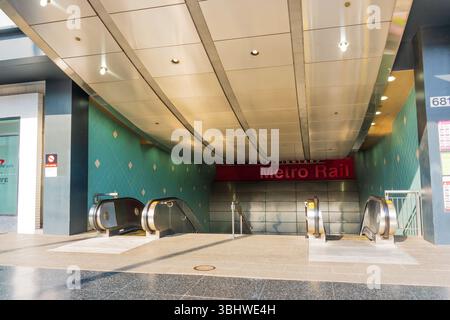 Los Angeles, California - December 23, 2024: Entrance to the Metro Rail station in Hollywood/Highland, featuring escalators and a modern design. Stock Photo