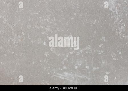 Abstract background of a textured grunge gray concrete wood slab, ideal for use as a design element Stock Photo