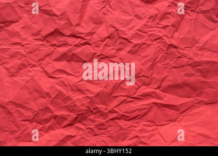 Red color crumpled paper for background. Stock Photo