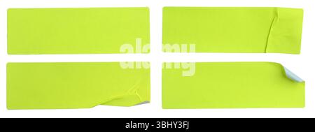 A set of fluorescent neon yellow rectangular paper sticker label isolated on white background. Stock Photo