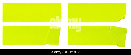 A set of fluorescent neon yellow rectangular paper sticker label isolated on white background. Stock Photo