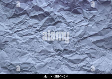 Purple color crumpled paper for background. Stock Photo