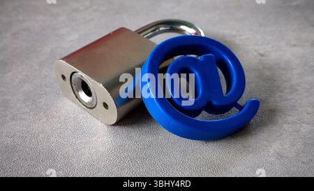 At symbol and padlock. Email security concept. Stock Photo