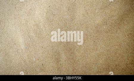 Close-up of a Textured Brown Paper Surface Stock Photo