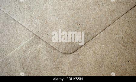 Close-up of a Textured Brown Paper Envelope Stock Photo