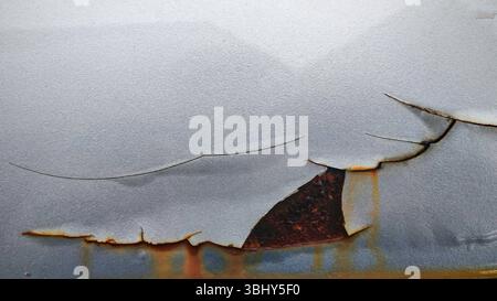 Paint Bubbling and Rust on a Car Surface Stock Photo