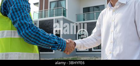 Engineer team hands shaking greeting start up plan new project contract in office center at construction site, industry ,architecture, partner, teamwo Stock Photo