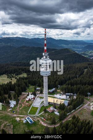 Aerial view to telecommunications tower at Snezhanka peak in winter resort Pamporovo, Bulgaria in Rhodope mountains Stock Photo