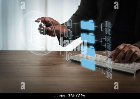 An office files report document person interacts with digital file management system, organizing folders and documents computer, symbolizing data Stock Photo