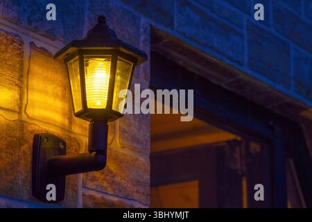 Decorative lantern on the wall of a private house Stock Photo
