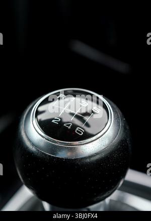 Gear transmission stick in car with 6 speeds, closeup detail Stock Photo