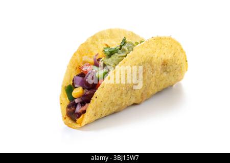 Close-up of a colorful vegetarian taco with kidney beans, corn, diced red onion, bell peppers, cherry tomatoes, fresh guacamole isolated on white back Stock Photo
