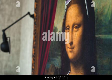 Framed Mona Lisa Reinterpretation with Sunglasses in Modern Setting Stock Photo