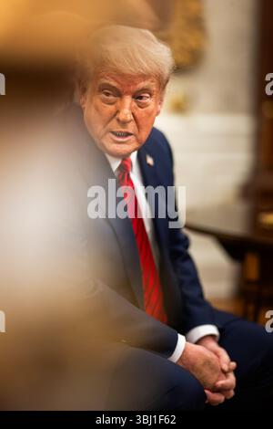 President Donald Trump holds a bilateral meeting with Prime Minister Giorgia Meloni of Italy, Thursday, April 17, 2025, in the Oval Office. Stock Photo