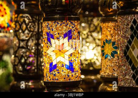 Traditional table lamps with glass bulbs in the form of a multi-colored mosaic. Stock Photo