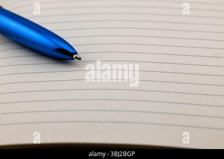 Notebook with ballpoint pen Stock Photo