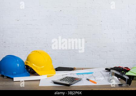 Various Construction Tools and Essential Safety Equipment are Displayed on the Table Stock Photo