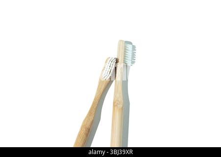 Eco-Friendly wooden Toothbrushes with Minimalist Design on White Background Stock Photo