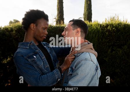 Two shirtless young men embracing Stock Photo - Alamy
