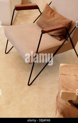 Modern chair on white carpet Stock Photo