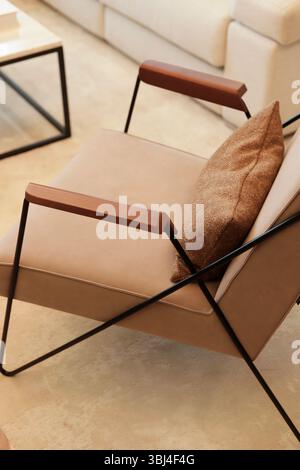 Modern chair on white carpet Stock Photo