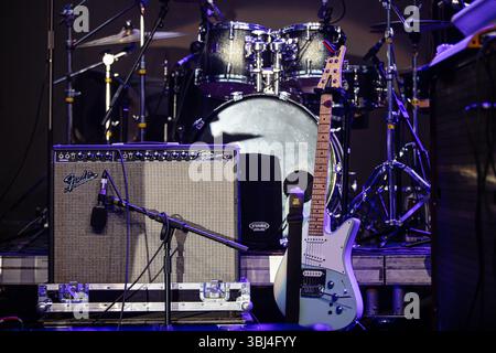 Lviv, Ukraine - June 30, 2019:Fender Twin Reverb Amplifier and Electric Guitar on Stage Stock Photo