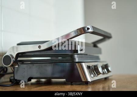 A Stylish Electric Grill that Ensures a Perfect Cooking Experience for Everyone at Home Stock Photo