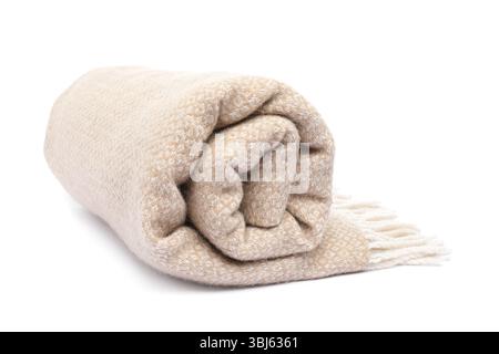 Folded beige woolen blanket isolated on white Stock Photo