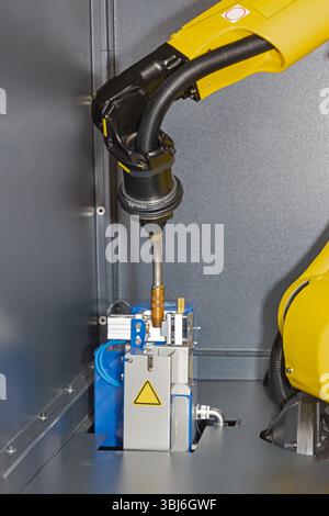 Automated Welding Robot Arm Metal Beam Workshop Stock Photo