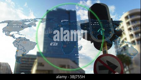 Displaying map with icons, green highlight over city street, with signal and no-right-turn sign Stock Photo