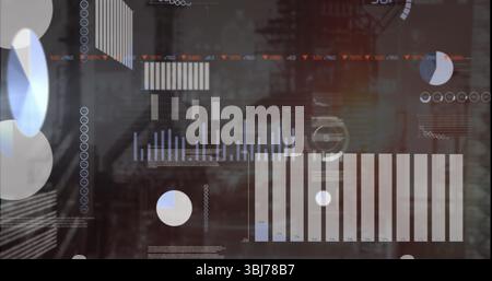 Displaying HUD-style dashboard showing data graphs in industrial backdrop, with bar and pie charts Stock Photo