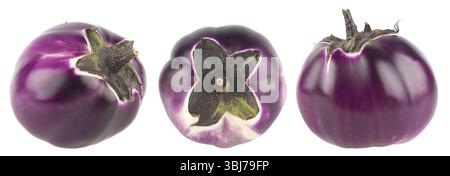 Ripe dark blue eggplants from different angles isolated on white background. Stock Photo