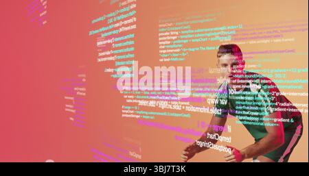 Man wearing green T-shirt and VR headset interacting with floating code in VR studio, copy space Stock Photo