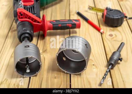 Set of two crowns drill bits for making holes for electrical sockets in concrete. Selective focus. Stock Photo
