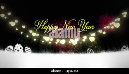 Gold Happy New Year text shining in snowy nighttime scene, with fireworks and heart-shaped lights Stock Photo
